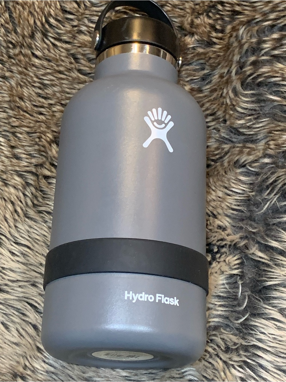 Hydro Flask 64 oz wide mouth with flex cap stone.